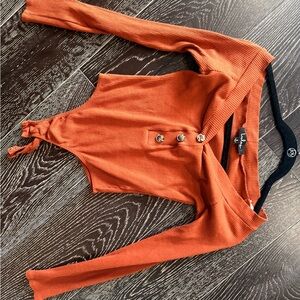 Brown Ribbed Long Sleeve body suit. Can be worn off shoulder as well.